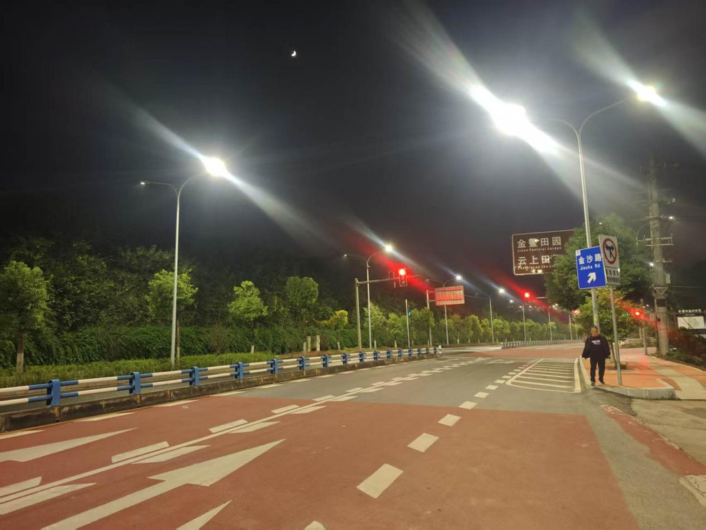 Brightly illuminated Dabin Road in Dadukou, Chongqing after the smart streetlight retrofit, February 2026.jpg
